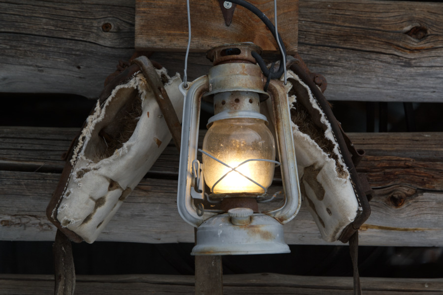 Lamp on shed in Sami country, on the Arctic Circle