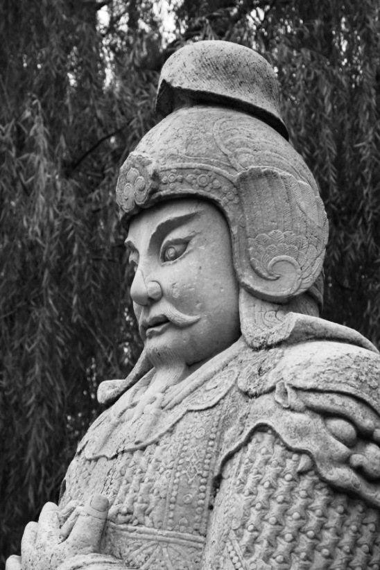 Statue of an emperor Ming dynasty in Beijing in black and white