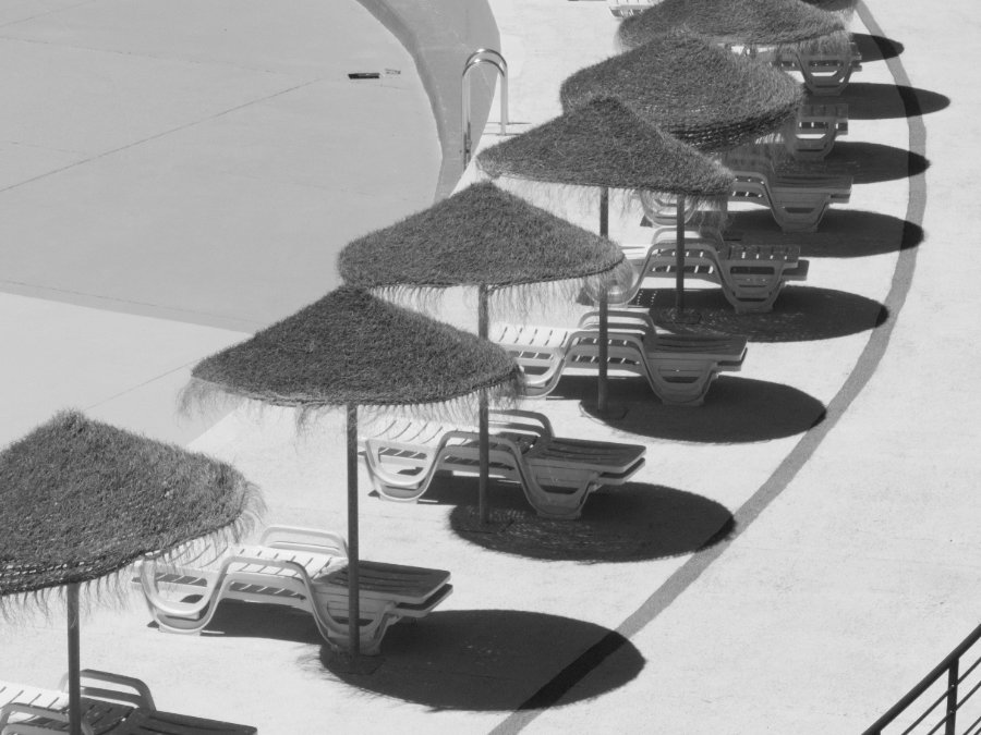 Poolside parasols in black-white